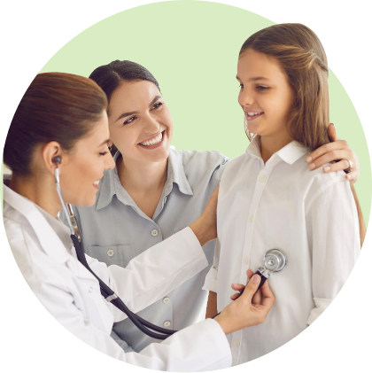 Doctor using a stethoscope on a smiling child while the parent looks on, symbolizing the care process supported by digital pediatric intake form solutions.